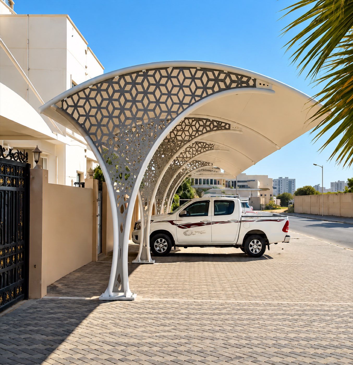 Curved aluminium and glass canopy over a villa driveway, fabricated by Fahad Shafiq Trading
