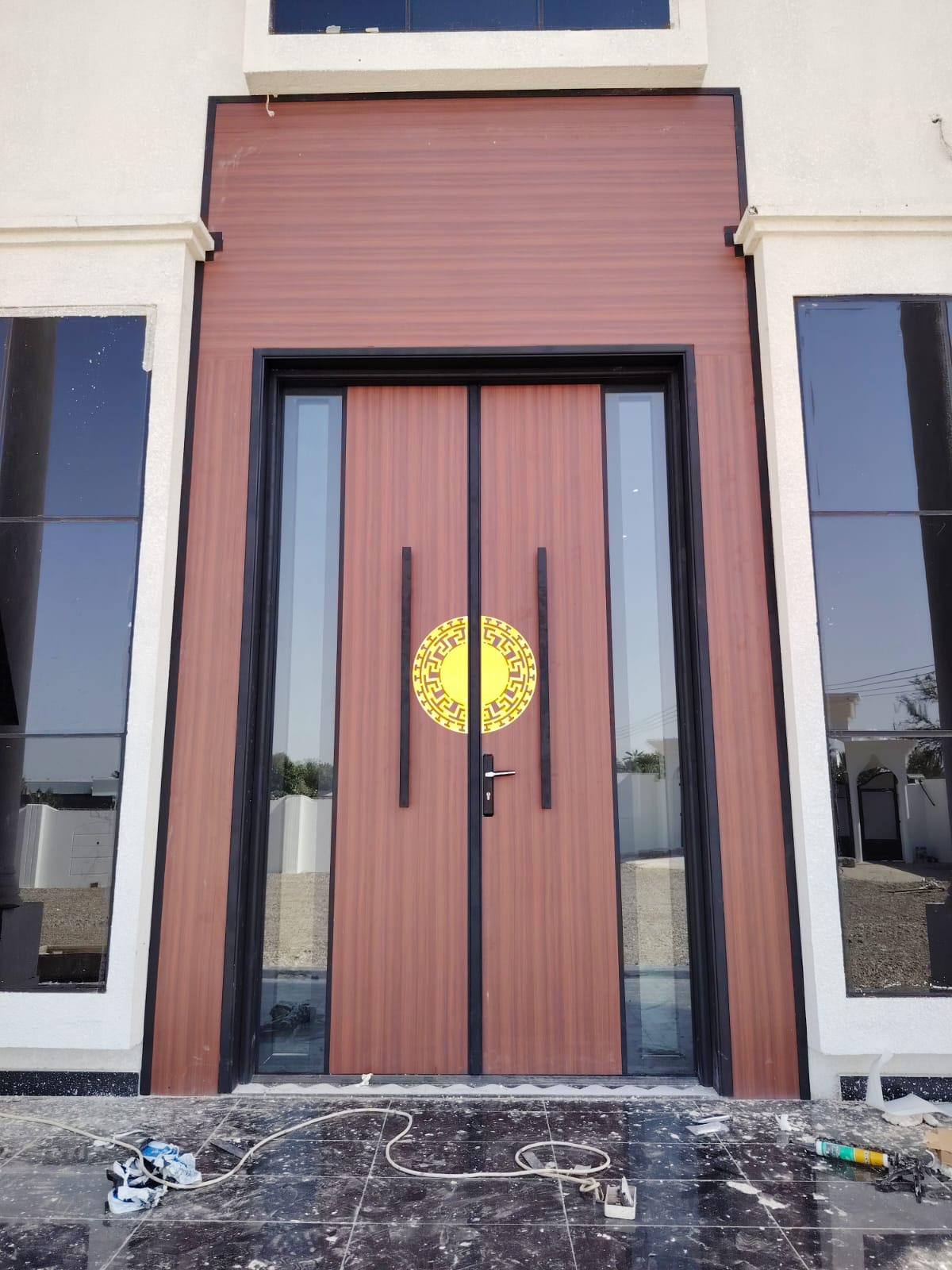 Double entrance doors with glass sidelights
